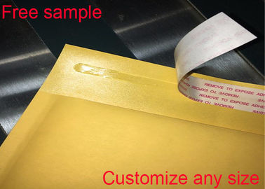 O enviamento amarelo do papel de embalagem envolve o selo autoadesivo Logo Printing Available